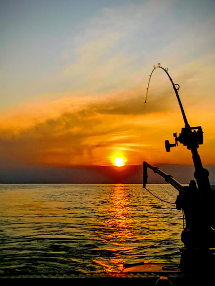 Recreation - fishing on Moose Pond, Athens, Maine.